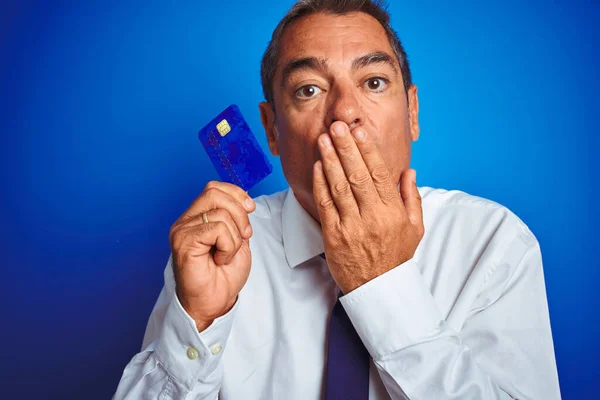 Handsome Middle Age Businessman Holding Credit Card Isolated Blue Background — Stock Photo, Image