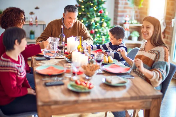 Beautiful Family Smiling Happy Confident Eating Roasted Turkey Celebrating Christmas — Stock Photo, Image