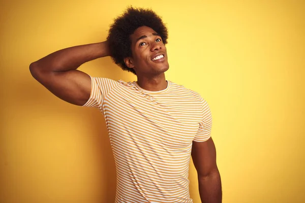 American Man Afro Hair Wearing Striped Shirt Standing Isolated Yellow — ストック写真
