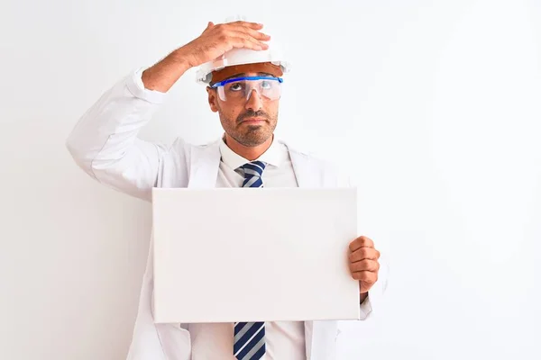 Young Chemist Man Wearing Security Helmet Holding Signboard Isolated Background — Stock Photo, Image