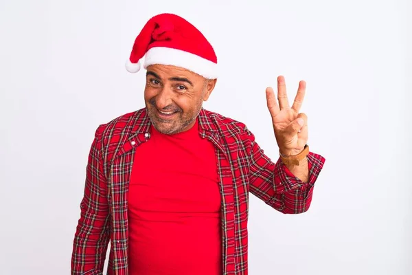 Hombre Mediana Edad Vistiendo Sombrero Santa Navidad Pie Sobre Fondo — Foto de Stock