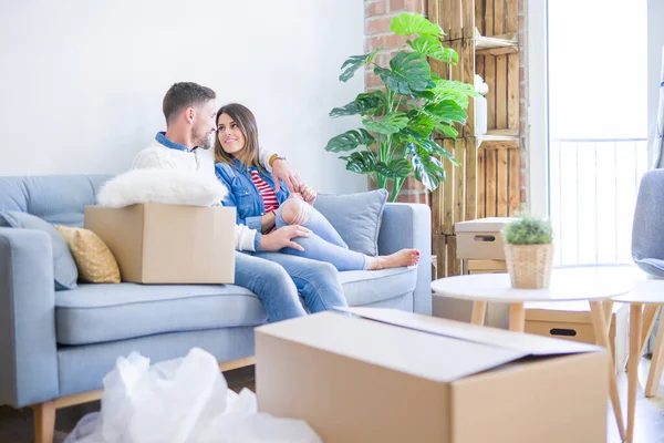 Young Beautiful Couple Standing New Home Cardboard Boxes Smiling Friendly — Stock Photo, Image