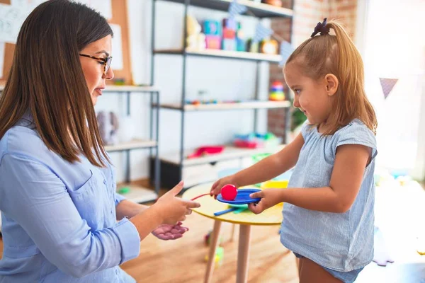 Caucasian Girl Kid Playing Learning Playschool Female Teacher Mother Daughter — Stock Photo, Image