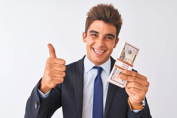 Joven Hombre Negocios Guapo Con Traje Sosteniendo Dólares Sobre Fondo — Foto de Stock