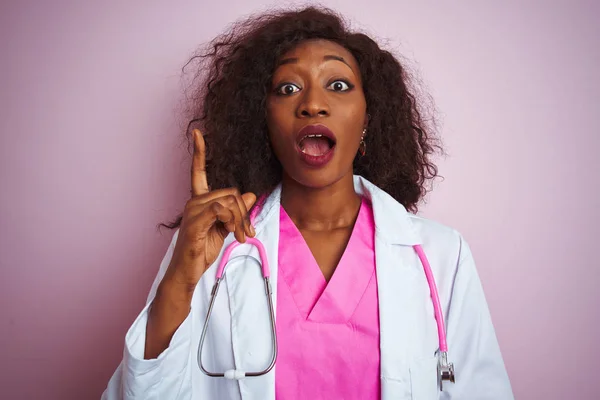 African American Doctor Woman Wearing Stethoscope Isolated Pink Background Pointing — Stock Photo, Image