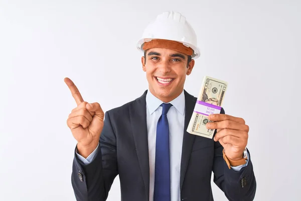 Young Handsome Architect Man Wearing Helmet Holding Dollars Isolated White — Stock Photo, Image