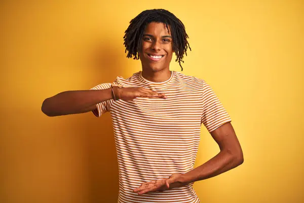 Afro Man Dreadlocks Wearing Striped Shirt Standing Isolated Yellow Background — Stock Photo, Image