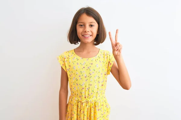 Young Beautiful Child Girl Wearing Yellow Floral Dress Standing Isolated — Stock Photo, Image