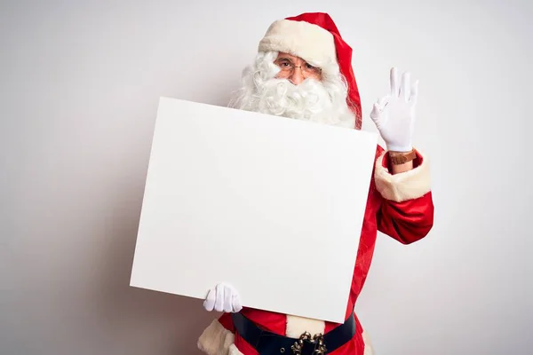 Middle Age Man Wearing Santa Claus Costume Holding Banner Isolated Royalty Free Stock Photos