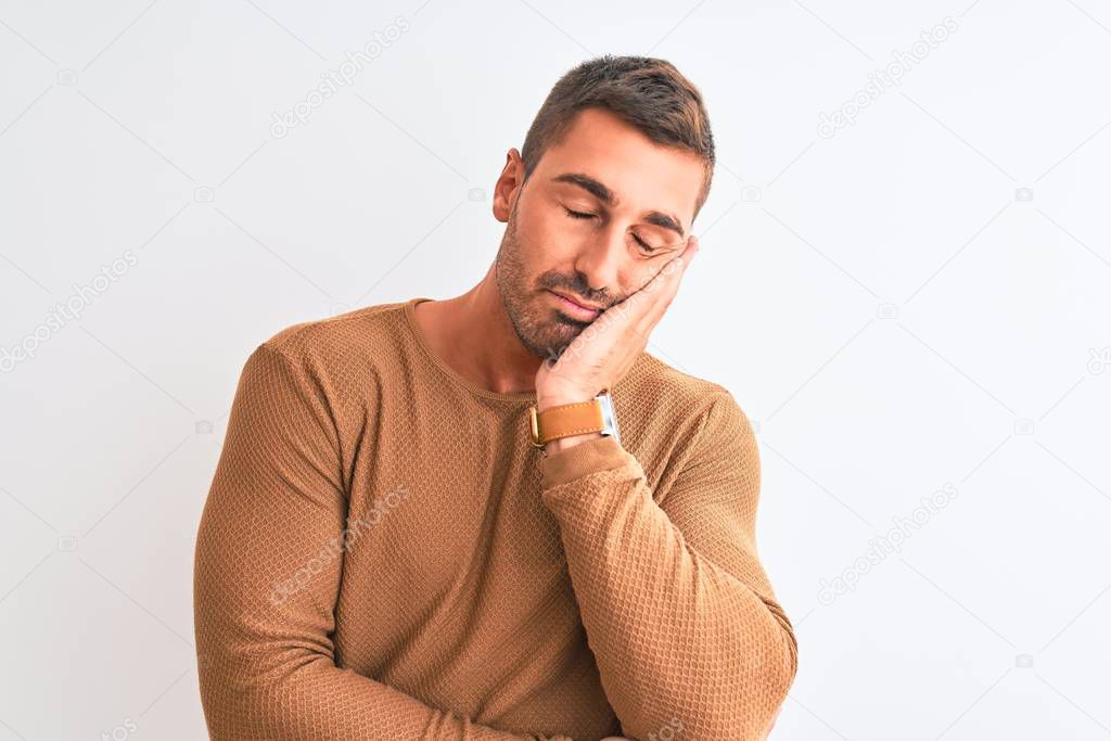 Young handsome elegant man wearing winter sweater over isolated background thinking looking tired and bored with depression problems with crossed arms.