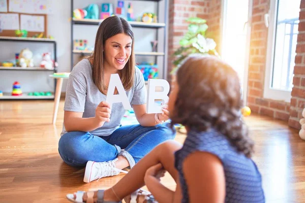 Beautiful Teacher Teaching Alphabet Student Toddler Girl Kindergarten — Stock Photo, Image