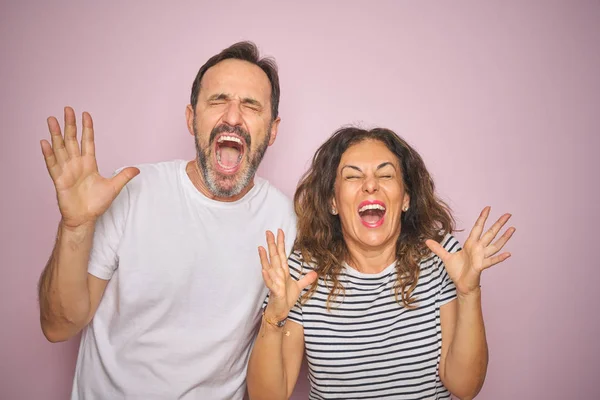 Beautiful Middle Age Couple Together Standing Isolated Pink Background Celebrating — 스톡 사진