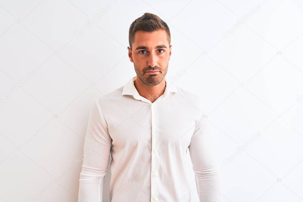 Young handsome business man wearing elegant shirt over isolated background depressed and worry for distress, crying angry and afraid. Sad expression.