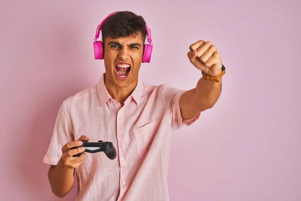 Indian Gamer Man Playing Video Game Using Headphones Isolated Pink — Stock Photo, Image