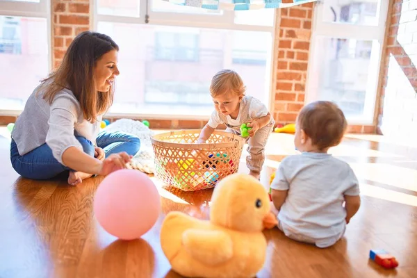 Beautiful Teacher Toddlers Playing Lots Toys Kindergarten — Stock Photo, Image