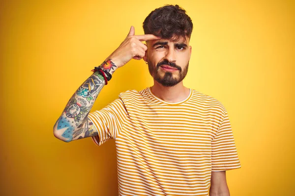 Young Man Tattoo Wearing Striped Shirt Standing Isolated Yellow Background — ストック写真