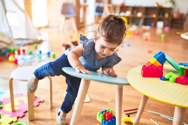 Beautiful Toddler Throwing Small Table Kindergarten — Stock Photo, Image