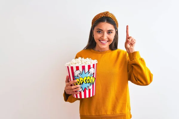 Young Beautiful Woman Holding Pack Popcorns Standing Isolated White Background — ストック写真
