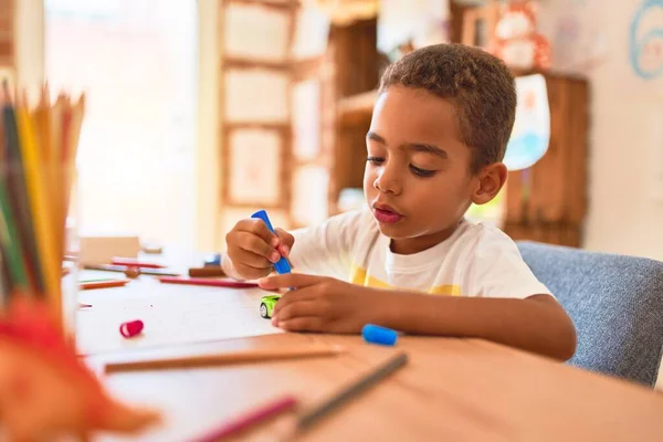 Beautiful African American Toddler Sitting Painting Car Toy Using Marker — ストック写真