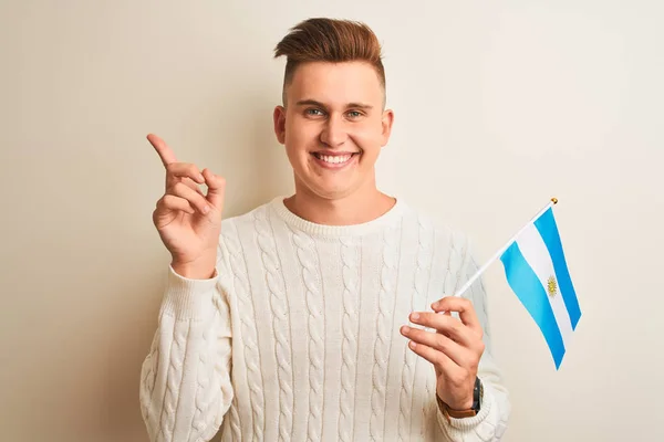 Young Handsome Man Holding Argentinian Argentina Flag Isolated White Background — Stock Photo, Image