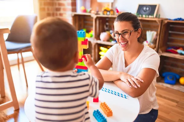 Beautiful Teacher Toddler Boy Playing Construction Blocks Bulding Tower Kindergarten — Stock Photo, Image