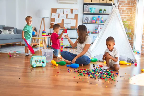 Young Beautiful Teacher Toddlers Playing Lots Toys Kindergarten — Stock Photo, Image