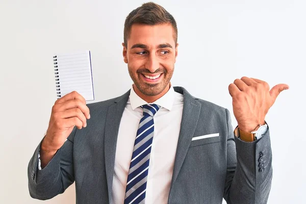 Young Handsome Business Man Holding Blank Notebook Isolated Background Pointing — 스톡 사진