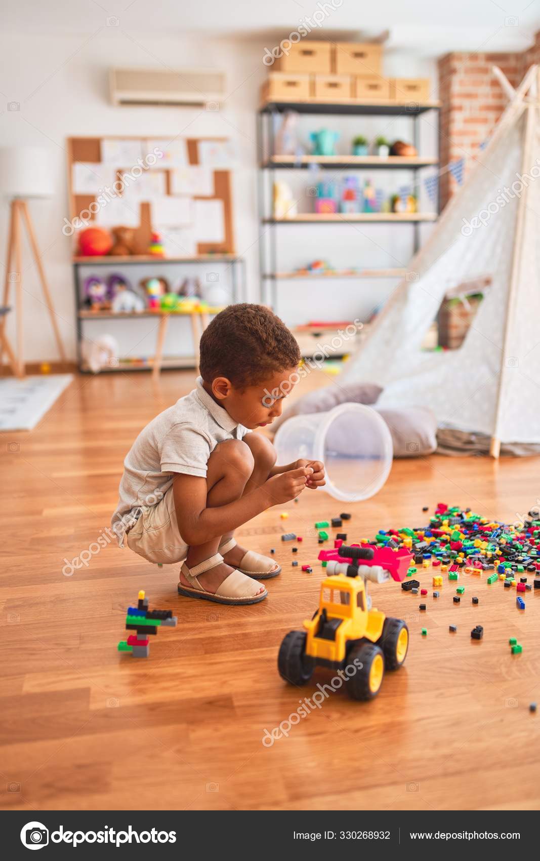 Beautiful African American Toddler Playing Small Building Blocks