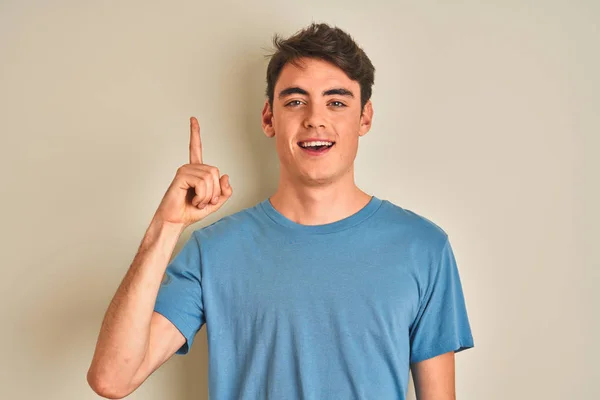 Teenager Boy Wearing Casual Shirt Standing Isolated Background Pointing Finger — Stock Photo, Image