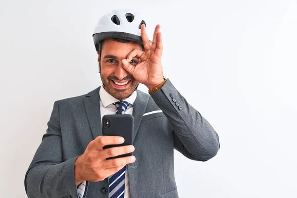 Young Handsome Business Man Wearing Bike Helmet Using Smartphone Isolated — 스톡 사진