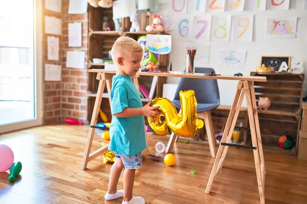 Young Caucasian Kid Playing Kindergarten Golden Balloon Preschooler Boy Happy — Stockfoto