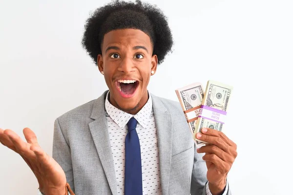 Joven Empresario Afroamericano Sosteniendo Dólares Pie Sobre Fondo Blanco Aislado —  Fotos de Stock