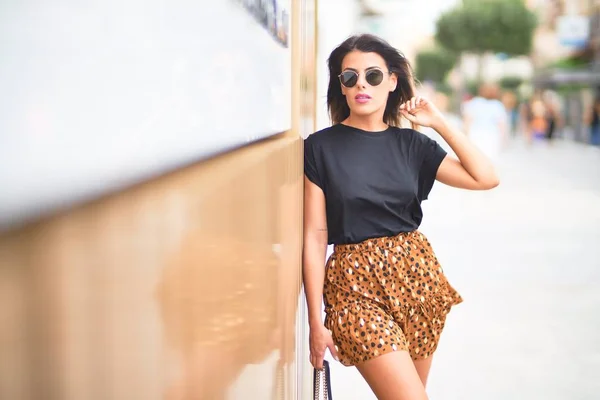 Young Beautiful Girl Wearing Sunglasses Shirt Animal Print Skirt Leaning — 스톡 사진