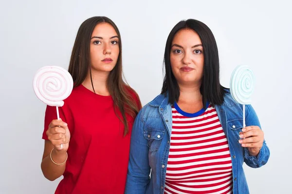 Young Beautiful Women Holding Sweet Lollipop Standing Isolated White Background — Stock Photo, Image