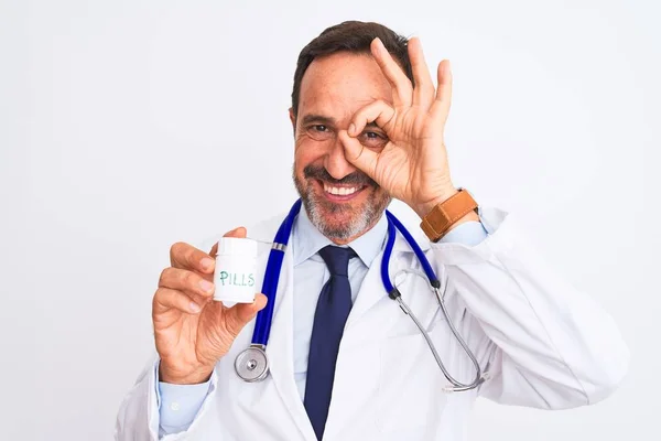 Middle Age Doctor Man Holding Pills Standing Isolated White Background — 스톡 사진