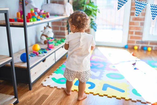 Adorable Toddler Holding Duck Doll Standing Lots Toys Kindergarten — Stock Photo, Image