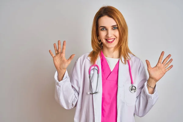 Redhead Caucasian Doctor Woman Wearing Pink Stethoscope Isolated Background Showing — Stok fotoğraf