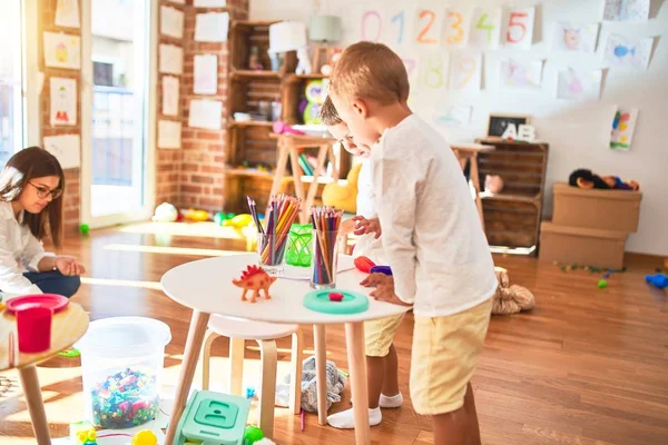 Beautiful Teacher Toddlers Playing Cooking Plastic Food Lots Toys Kindergarten — Stock Photo, Image