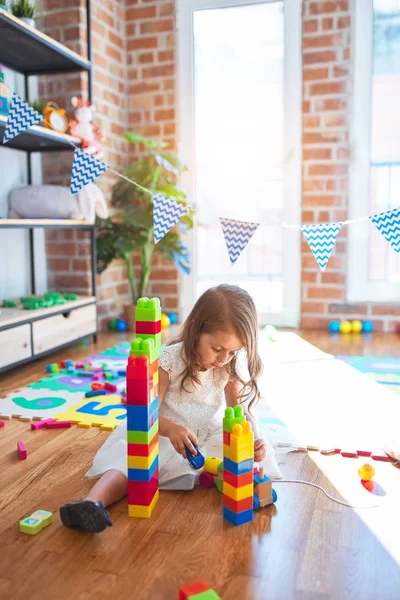 Adorable Blonde Toddler Playing Building Blocks Lots Toys Kindergarten — Stock Photo, Image