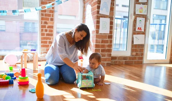 Beautiful Teacher Toddler Playing Lots Toys Kindergarten — Stock Photo, Image