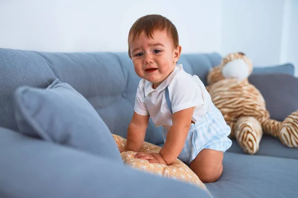 Adorable Toddler Sitting Sofa Crying Home — 스톡 사진