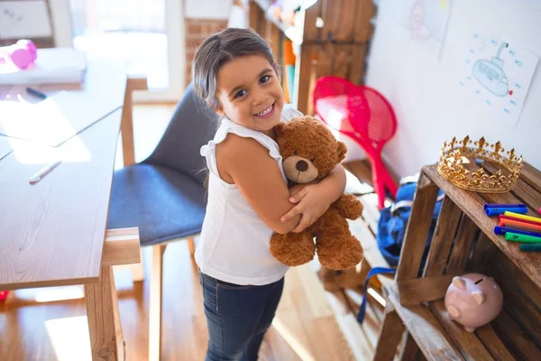 Adorable Toddler Smiling Happy Hugging Teddy Bear Lots Toys Kindergarten — Stock Photo, Image