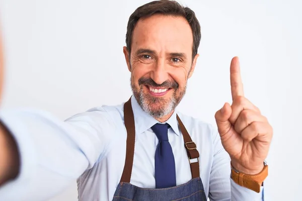 Middle Age Shopkeeper Man Wearing Apron Make Selfie Isolated White — 스톡 사진