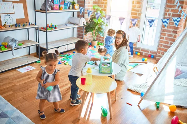 Beautiful Teacher Group Toddlers Playing Lots Toys Kindergarten — Stock Photo, Image