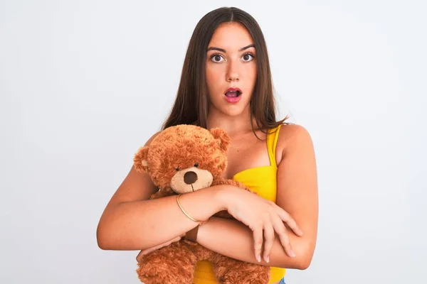 Young Beautiful Girl Holding Cute Teddy Bear Standing Isolated White — 스톡 사진