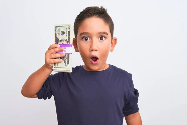 Beautiful Kid Boy Holding Dollars Standing Isolated White Background Scared — Stock Photo, Image