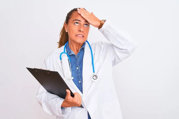 Middle Age Mature Doctor Woman Holding Clipboard Isolated Background Stressed — 스톡 사진