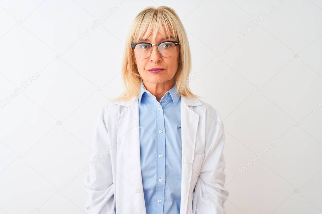 Middle age scientist woman wearing glasses standing over isolated white background with serious expression on face. Simple and natural looking at the camera.