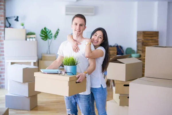 Young Beautiful Couple Sitting Floor New Home Cardboard Boxes Celebrating — 스톡 사진