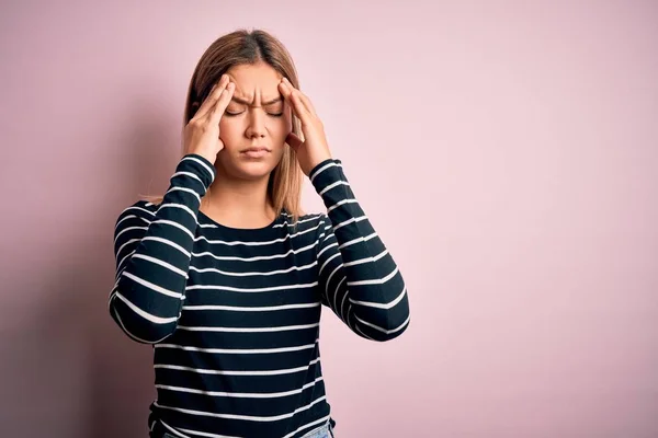 Young Beautiful Blonde Woman Wearing Casual Striped Sweater Pink Isolated — 스톡 사진